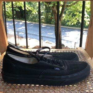 All black Vans Authentics